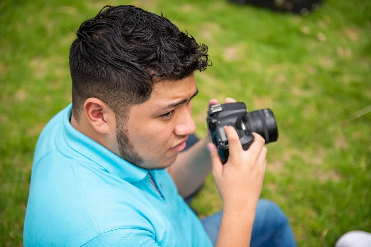 An autistic person engaging in photography.